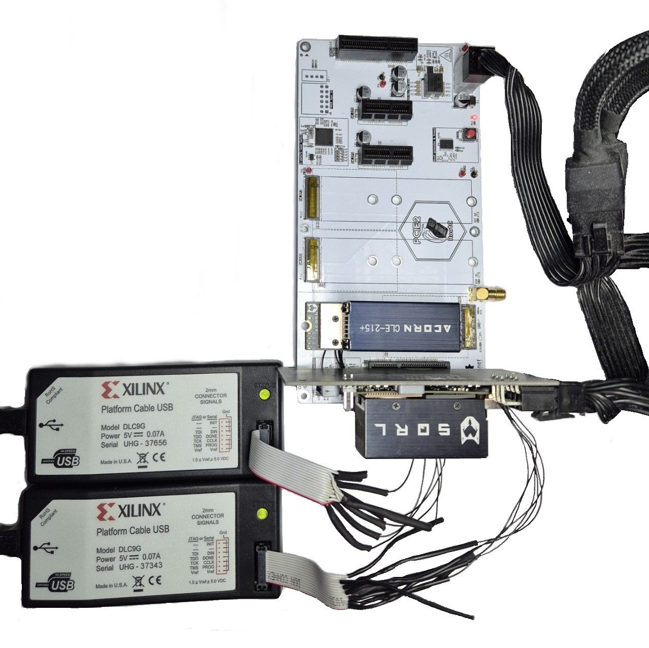 openPCIE direct-link test setup with two Acorn FPGA modules and two Xilinx JTAG programmers
